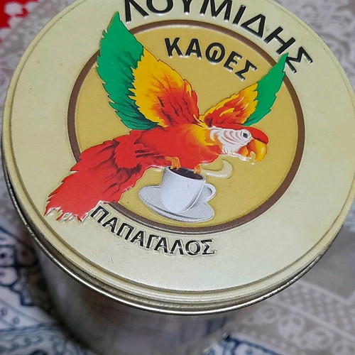 Metal coffee tin Loumidis used
