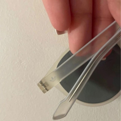 Adidas Originals sunglasses with transparent frame and purple mirror lenses