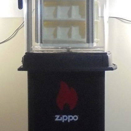 Zippo lighter display stand used, illuminated and rotating with storage base for 60 lighters