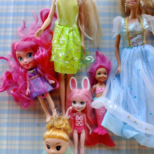 Various dolls with accessories