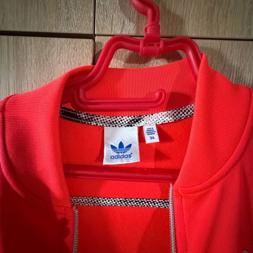 Adidas jacket orange like new, with fleece lining