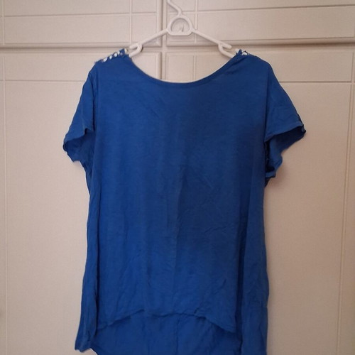 Loose blouse like new, blue with lace back design