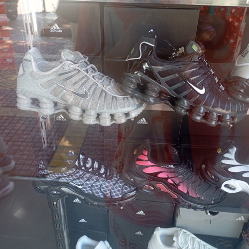 Nike Shox athletic shoes new, black and gold