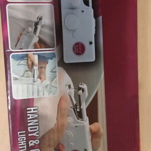 Handheld sewing machine like new