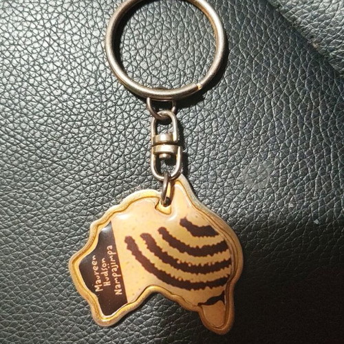 Australia Oceania Keychain like new with gold print