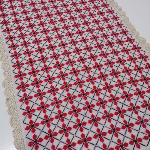 Large embroidered table runner used with handmade lace