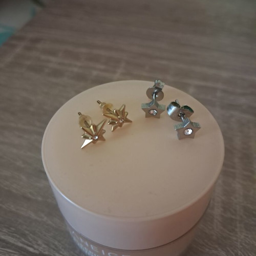 Steel earrings used, gold and silver set
