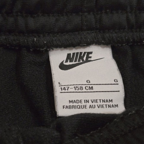 Nike kids' black tracksuit pants like new for ages 9-12