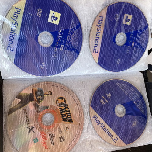 Vintage PC and PlayStation 2 gaming bundle with case, 70 CDs/DVDs