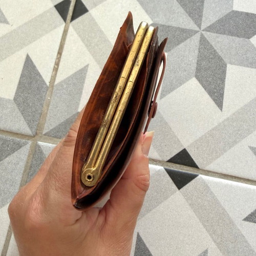 Vintage brown leather wallet used with frame closure