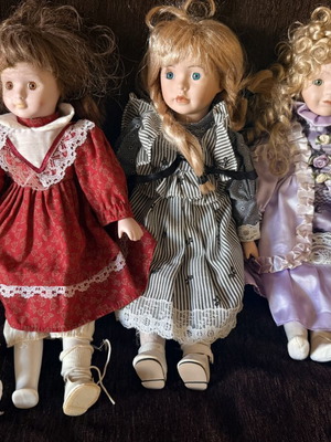 Set of 3 vintage porcelain collectible dolls with fabric clothes used