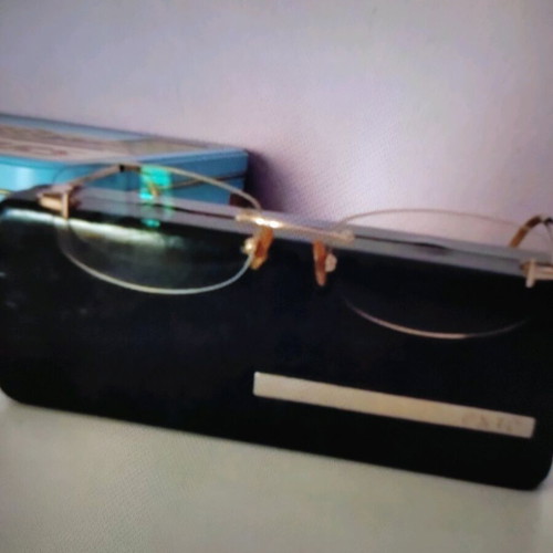 Exte women's eyeglasses like new, gold minimal