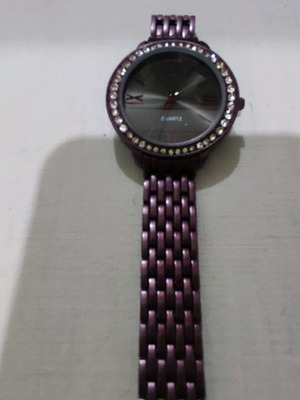 Purple wristwatch women's used with bracelet and rhinestones