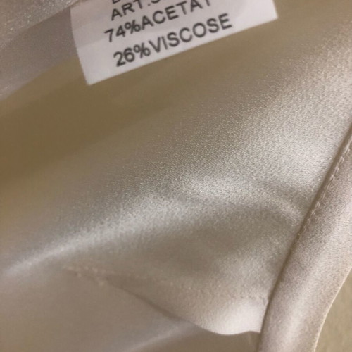 Lucifair pants and top set like new, cream-black