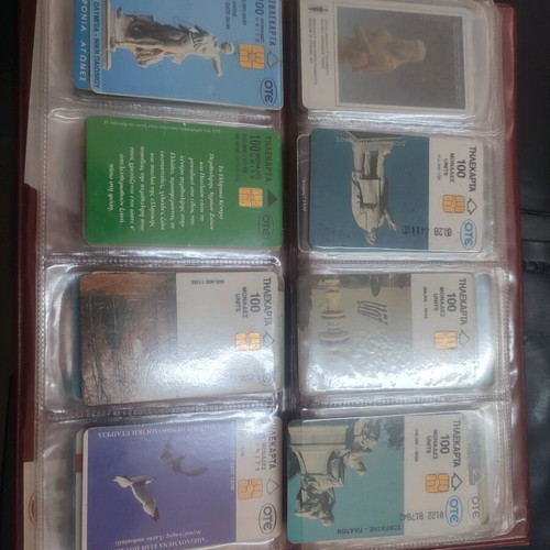 Phone cards used, album with 66 pieces