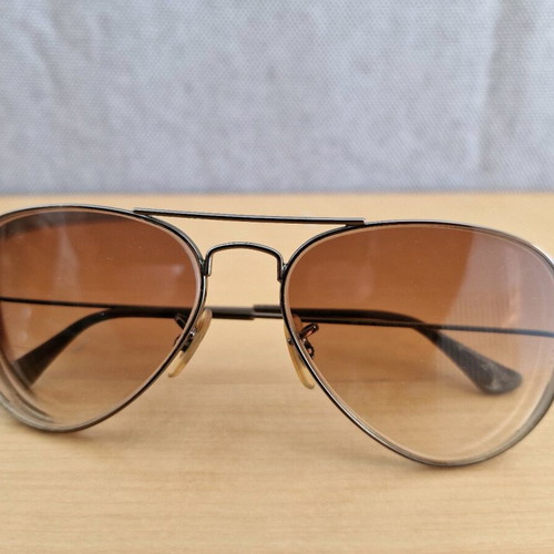 Rayban sunglasses used with metal frame and brown myopic lenses