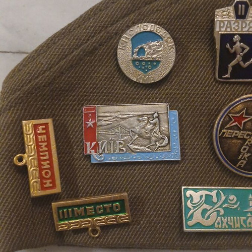 Soviet military pilotka hat with 13 badges and medals, new