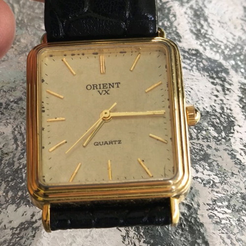 Vintage Orient watch used with leather strap