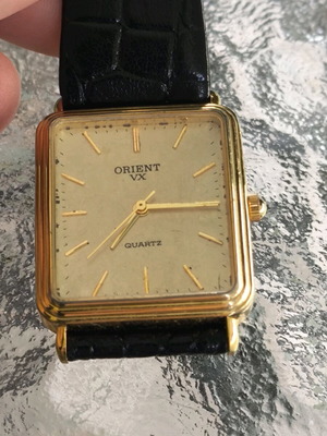 Vintage Orient watch used with leather strap