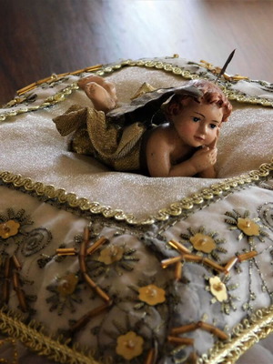 Vintage pillow with angel used