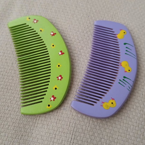 Wooden combs with handmade painted designs