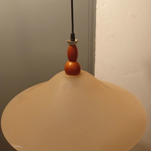 Ceiling light used, wood with soft peach glass