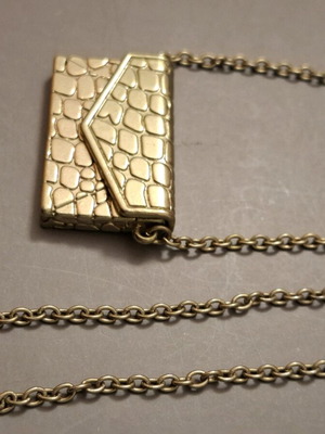 Abysse pendant bag in gold tone with chain used