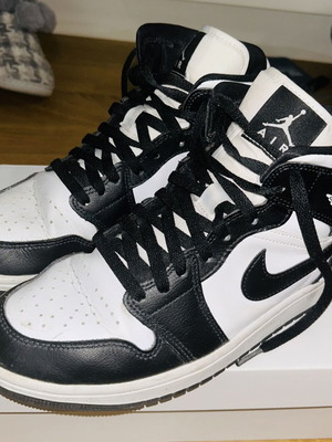 Nike Air Jordan athletic shoes, black and white, size 40.5