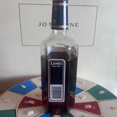 Lamb’s Navy Rum like new with hexagonal bottle