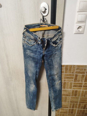 Staff women's blue jeans with faded details and rips, size 24
