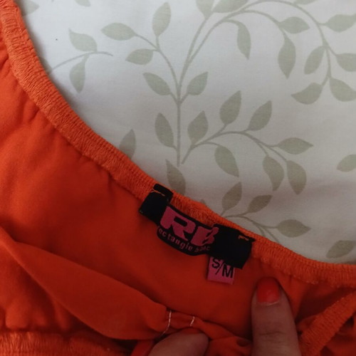 Beige shorts and orange top set