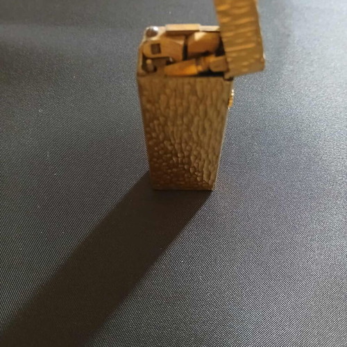 Dunhill Rollagas lighter used with goldplated finish and embossed design