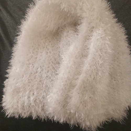 White scarf like new with silver sparkles and decorative beads