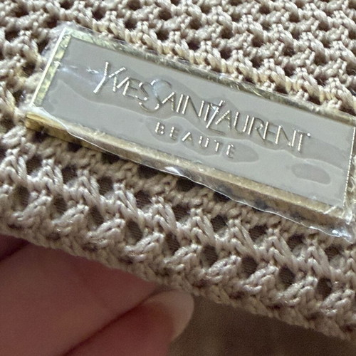 Yves Saint Laurent clutch bag, beige, new with tags