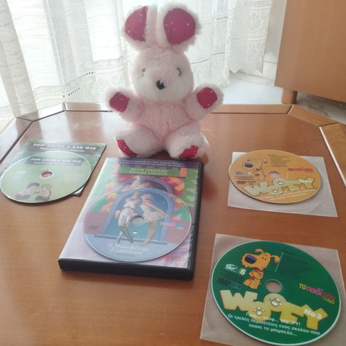 Vintage children's DVD set of 4 movies with plush bunny gift