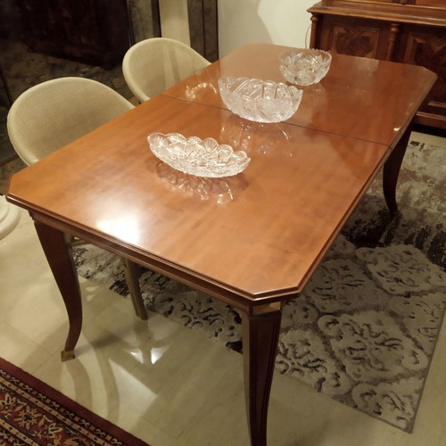 Wooden rectangular dining table used with extension leaf for 6-8 people