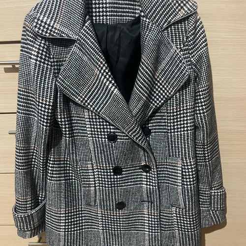 Checked coat medium like new, black and white