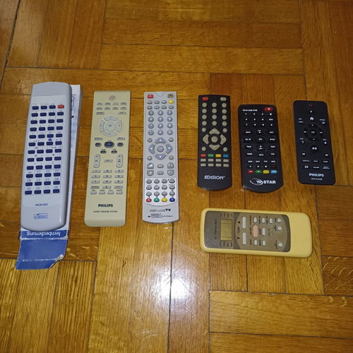 Set of 7 different TV remote controls