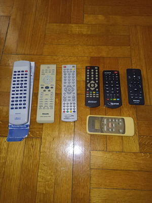 Set of 7 different TV remote controls