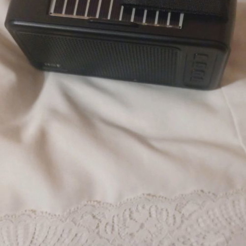 Wireless speaker used with flashlight and solar charging