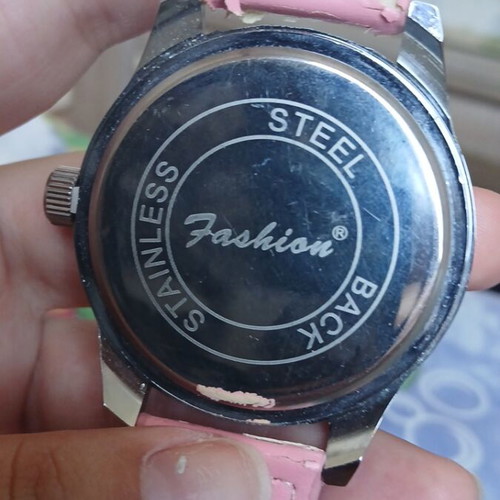 Fashion pink watch with silver used, slight wear