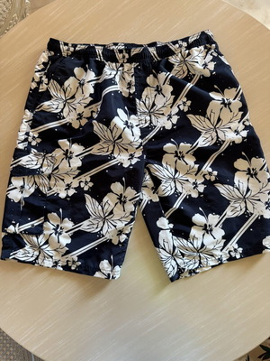 Crivit men's swim shorts XL used, blue and white floral