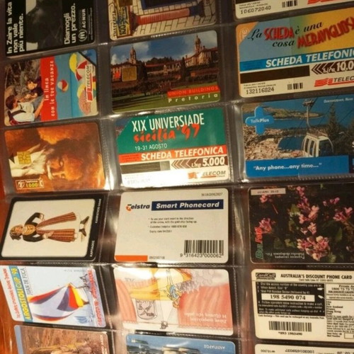 Phone card album like new, 75 cards from various countries and Greece