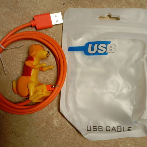 iPhone charger new with moving dog figure