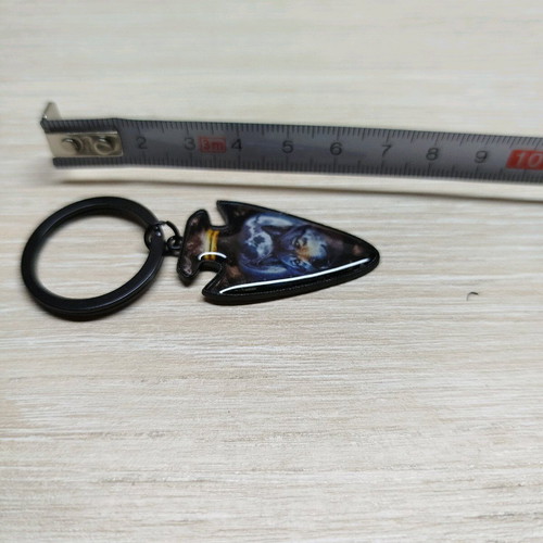 Alpha keychain new, black with wolf design
