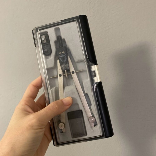 Compass used with box, sharpener, and replacement tips