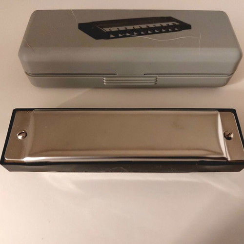 Metal harmonica 10 holes like new with case and cloth