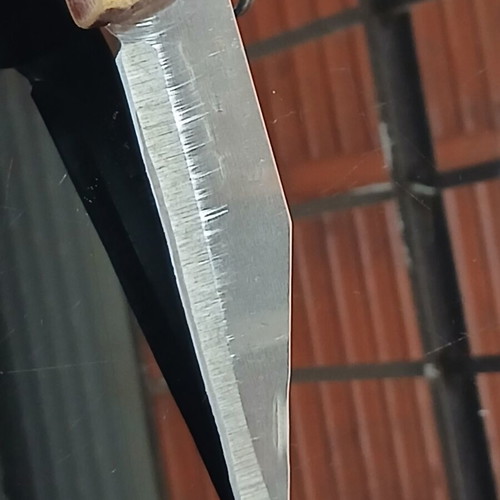 Okapi pocket knife used, carbon steel blade, wooden handle