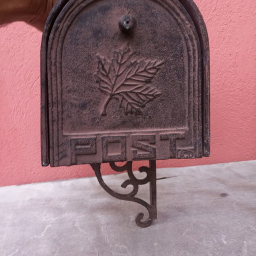 Cast iron mailbox used with metal base for wall or pole mounting