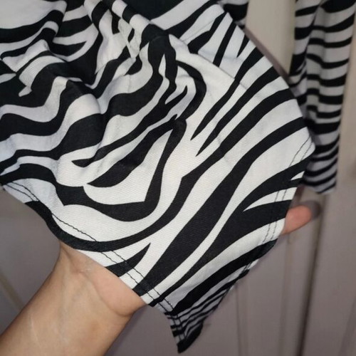 Long-sleeve zebra print bodysuit with V-neck and knot, like new